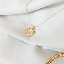 Load image into Gallery viewer, The Globe Trotter - 18k gold filled world/globe coin medallion on 14k gold filled cable chain. Jewelry for the traveler or adventurer. High quality, tarnish resistant. Great gift for graduation, retirement, promotion, or new job.