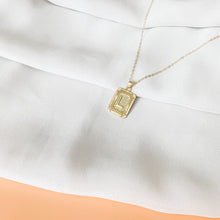Load image into Gallery viewer, Unapologetically You - 14k gold filled rectangle initial necklace. Tag pendant with uppercase letter on cable chain. High quality, tarnish resistant.