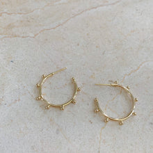 Load image into Gallery viewer, 18k gold filled thin hoop earrings with ball stud detail. Open hoop, push back closure. Lightweight, high quality, tarnish resistant. Shown in 1 inch size.