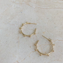 Load image into Gallery viewer, 18k gold filled thin hoop earrings with ball stud detail. Open hoop, push back closure. Lightweight, high quality, tarnish resistant. Shown in 1 inch size.