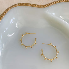 Load image into Gallery viewer, 18k gold filled thin hoop earrings with ball stud detail. Open hoop, push back closure. Lightweight, high quality, tarnish resistant. Shown in 1 inch size.