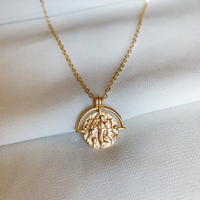 Load image into Gallery viewer, 14k gold filled custom zodiac sign necklace. Double sided zodiac coin medallion on cable chain. High quality, tarnish resistant. Choose your zodiac sign. Pictured in Virgo.