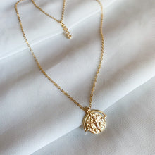Load image into Gallery viewer, 14k gold filled custom zodiac sign necklace. Double sided zodiac coin medallion on cable chain. High quality, tarnish resistant. Choose your zodiac sign. Pictured in Virgo, and shown layered with our dainty Virgo zodiac word bar necklace.