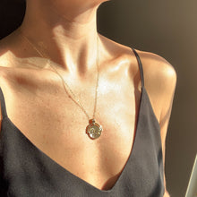 Load image into Gallery viewer, The Globe Trotter - 18k gold filled world/globe coin medallion on 14k gold filled cable chain. Jewelry for the traveler or adventurer. High quality, tarnish resistant. Great gift for graduation, retirement, promotion, or new job. Shown on model at 18" length.