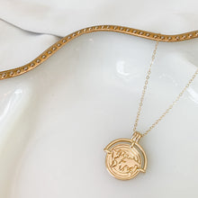 Load image into Gallery viewer, The Globe Trotter - 18k gold filled world/globe coin medallion on 14k gold filled cable chain. Jewelry for the traveler or adventurer. High quality, tarnish resistant. Great gift for graduation, retirement, promotion, or new job.