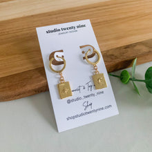 Load image into Gallery viewer, Mismatched Star and Moon Gold Filled Huggie Earrings
