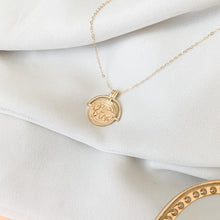Load image into Gallery viewer, The Globe Trotter - 18k gold filled world/globe coin medallion on 14k gold filled cable chain. Jewelry for the traveler or adventurer. High quality, tarnish resistant. Great gift for graduation, retirement, promotion, or new job.
