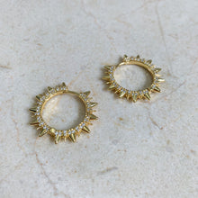 Load image into Gallery viewer, 24k gold filled micro pave spike hoop earrings. 1.5 inch huggies made with clear CZ stones. High quality, tarnish resistant. Trendy statement earrings with rave reviews.
