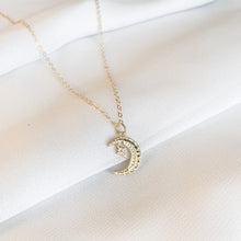 Load image into Gallery viewer, The Light in the Darkness - 14k gold filled hammered crescent moon with clear CZ stones on 14k gold filled cable chain. High quality, tarnish resistant.
