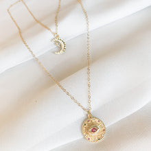 Load image into Gallery viewer, The Light in the Darkness - 14k gold filled hammered crescent moon with clear CZ stones on 14k gold filled cable chain. High quality, tarnish resistant. Shown layered with gold evil eye coin necklace.

