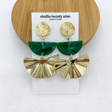 Load image into Gallery viewer, Emerald green half moon and gold fan statement earrings with textured round gold stud. Unique design with an Art Deco vibe that will elevate any special occasion style, especially wedding guest style.
