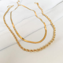Load image into Gallery viewer, 18k gold filled chunky rope chain. High quality, tarnish resistant classic twisted rope style necklace. Shown layered with our gold filled herringbone chain.
